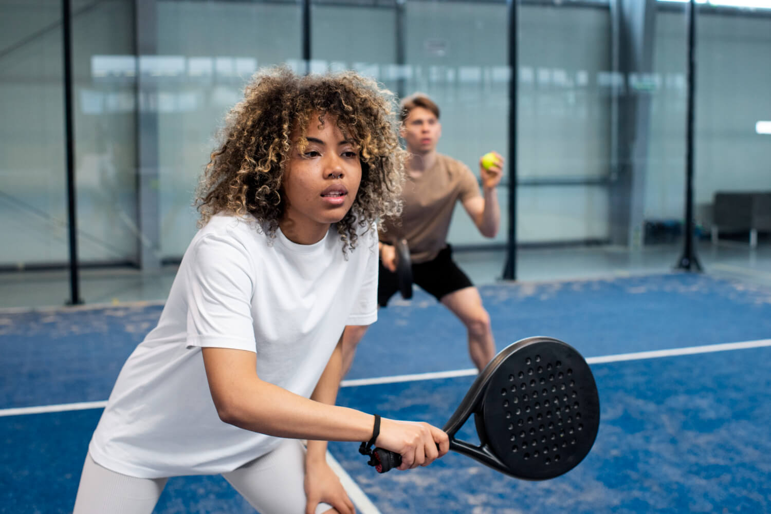 Smiling female padel player in athletic sports clothing on court – Jacob  Lund Photography Store- premium stock photo