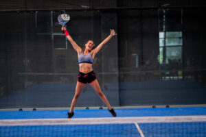 best padel rackets for women with happy padel player
